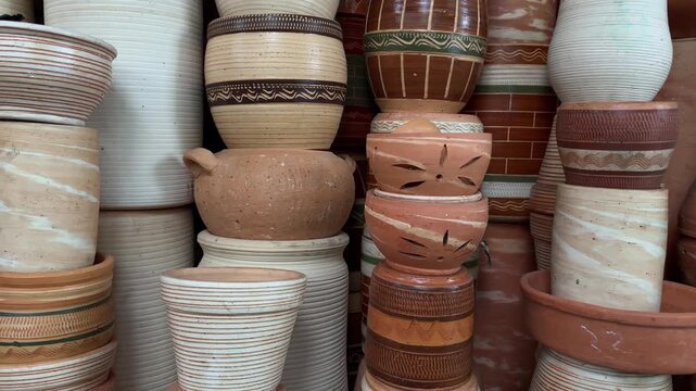 Stacks of handmade clay terracotta pots