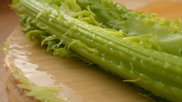 Fresh celery stalk on cutting board
