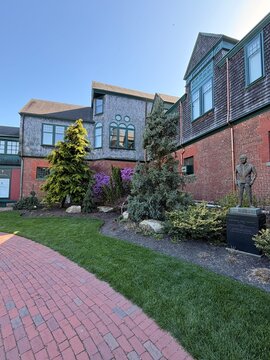 Brick and Shingle Building at International Tennis Hall of Fame, Historic Newport Casino Newport Rhode Island RI USA. Courtyard Grass Courts. Jimmy Van Alen, Founder Statue. Tie Breaker Vasss Scoring