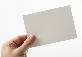 Obraz premium Hand holding blank white business card mockup on white background