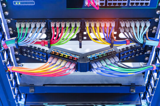 network cable connecting on network core switch close up