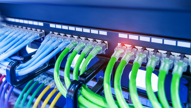 network cable connecting on network core switch close up