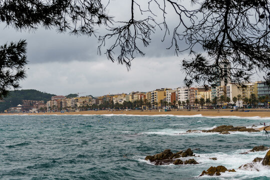 General view of the beach and promenade of Lloret de Mar, Catalonia, Spain.