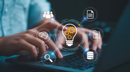 Fototapeta premium Creative brainstorming with digital icons and lightbulb