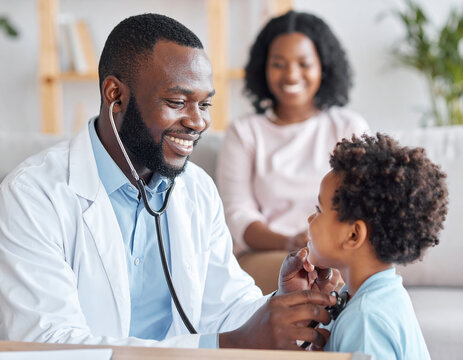 A pediatrician examines a sick child with a smile in the clinic; the child is pictured happily with his mother.
