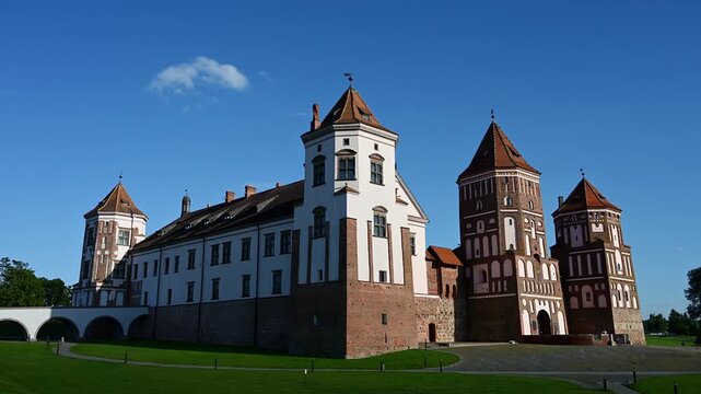 Mir Castle Complex in Belarus at sunset, UNESCO World Heritage site. Medieval fortress with gothic, renaissance architecture, historical landmark, cultural heritage, tourism concept