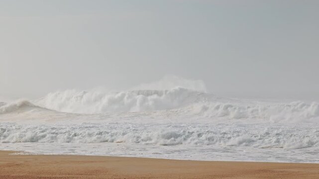 Big waves crushing in winter season in Nazare, Portugal