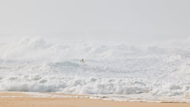 Big waves crushing in winter season in Nazare, Portugal
