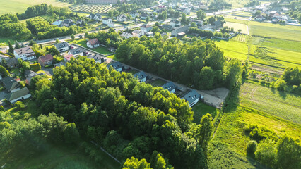 Obraz premium Newly built houses surrounded by natural greenery
