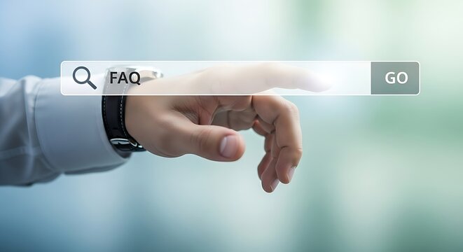 A close up of a person?s hand pressing the search button on a laptop while typing FAQ in the search bar, ideal for digital marketing, customer support, or tech related content.