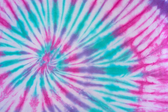 Real Authentic Cotton Multicolor Tie Dye Pattern On Shirt Background With Pink Teal Purple Green And Blue Swirls