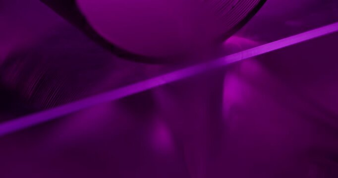 Neon vapor. Spill light smog. Defocused purple color bright round texture drip dazzle gleam flow on abstract creative art background.