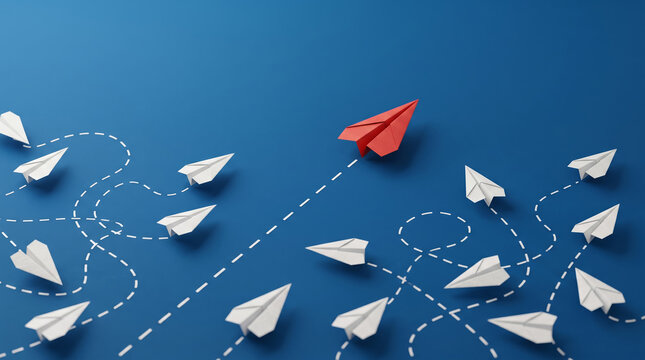 Red paper plane leading white ones on blue background, leadership and business guidance concept
