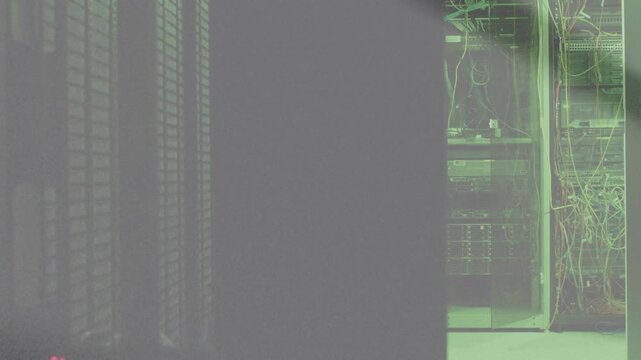 Incoming diagonal shadow entering frame, sweeping panel, changing contrast and revealing rack LEDs