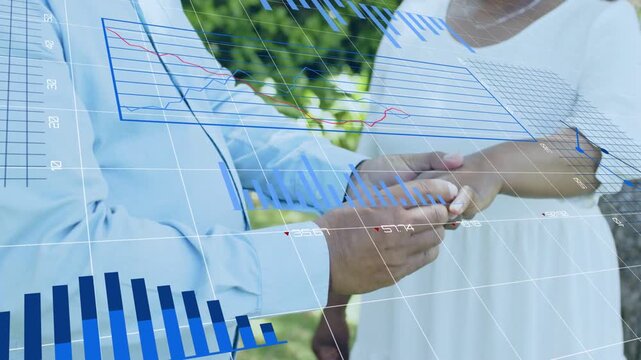 Man revealing ring and placing it on woman's finger in wedding, HUD charts framing hands