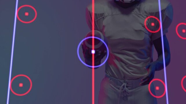 Football player adjusting grip as neon center line appears, following HUD targets for sports tech