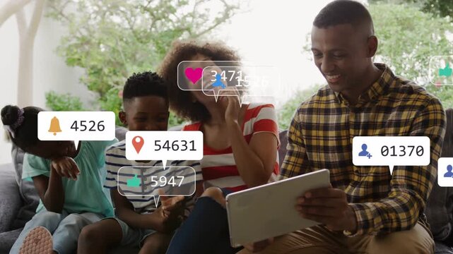 Dad scrolling tablet to share post, family laughing while social alert bubbles floating around
