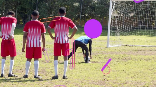 Kicker placing ball running up shooting 4 forming wall sports overlay appearing over wall for shot