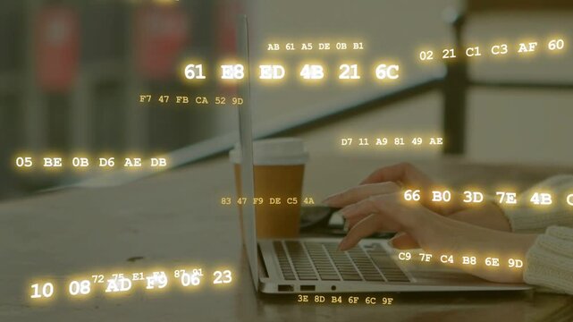 Adult female starting typing fingers pressing keys while hex overlay flowing over laptop for tech
