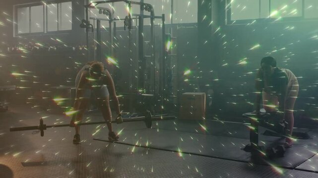 Two women in gym, left woman gripping barbell, starting strength lift, particles tracing motion