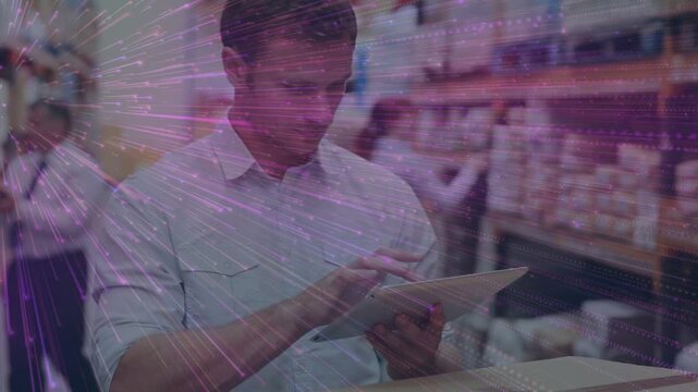 Retail employee tapping tablet, activating purple light overlay while checking inventory, centering