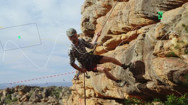 Climber pulling rope to rappel, rappelling rock face with dashed red marking footholds for training