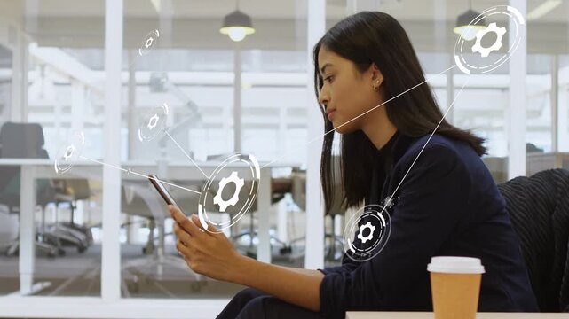 Woman tapping device in lounge, initiating AR gear nodes linking around hands for technology setup