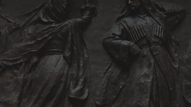 Russia. St. Petersburg, August 8, 2020 A pair of statues depicting a couple on a city wall mural