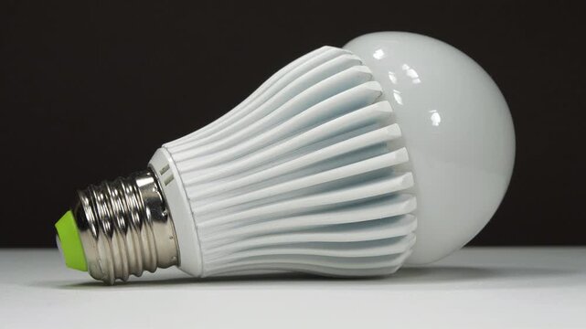 Large LED lamp with E27 base on black background