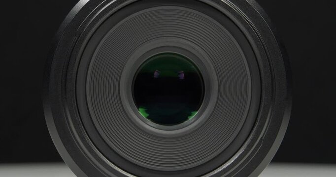 Black macro camera lens, zoom-in video
