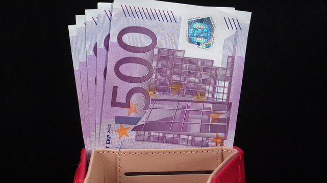 European money. 500 euro banknotes in wallet. Two and a half thousand euros in five 500 euro banknotes. Euro banknotes, EURO