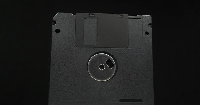 Black floppy diskettes. Floppy disk, diskette, or floppy diskette - type of disk storage made from a thin, flexible disk coated with magnetic storage medium