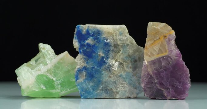 Natural minerals - blue lazurite or Azure spar, green and violet fluorites