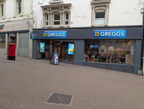 Stoke Hanley UK May 2 2026 Greggs shop front and window display.