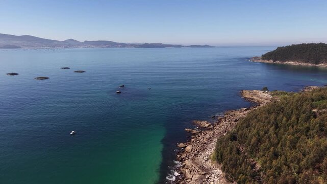 Rax&oacute;, Poio Pontevedra Galicia. Coastal town bay with fishing boats and beach