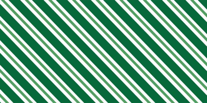 Christmas seamless pattern. Red and green diagonal stripes background. Candy cane repeating decoration wallpaper. Winter holiday lines backdrop. Xmas peppermint present wrapping print design. Vector