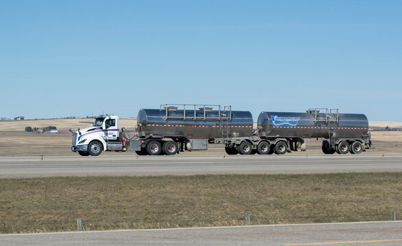 Airdrie, Alberta, Canada. April 30, 2026. A truck hauling freight along the Queen Elizabeth II Highway near Airdrie, Alberta, Canada.