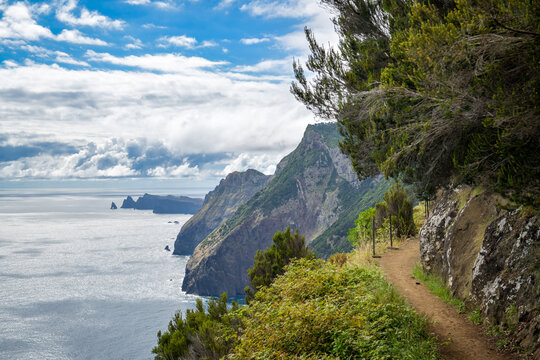 Coastal hiking trail along volcanic Atlantic cliffs