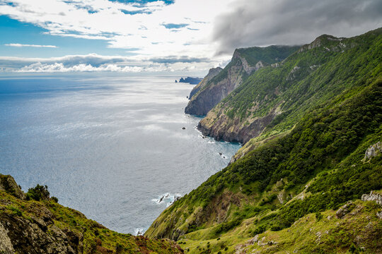 Lush green cliffs plunging into Atlantic Ocean