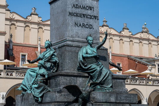 The Adam Mickiewicz Monument in the Main Market Square of Krakow. A bronze statue of the Polish national poet situated in front of the Sukiennice Cloth Hall in the Old Town, Poland.