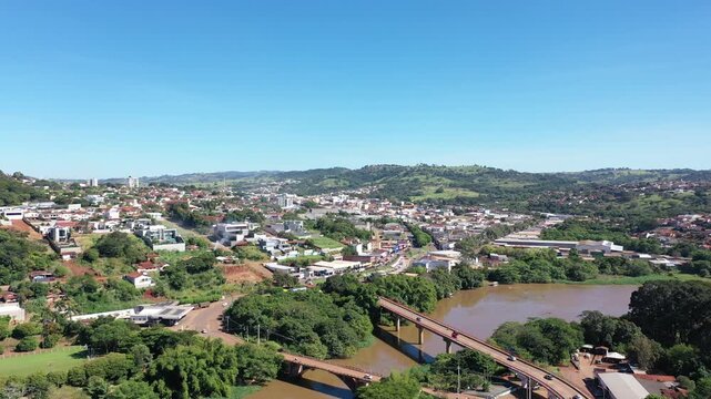 Aerial view of town of Ceres surrounded by mountains and green valleys on May, 2026. Ceres, Goias, Brazil