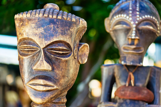Hand-Carved Chokwe Pwo and Mwana Pwo Tribal Statues female ancestor figure with white facial markings