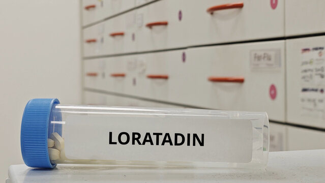 LORATADIN tablets used to relieve allergy symptoms such as rhinitis and urticaria