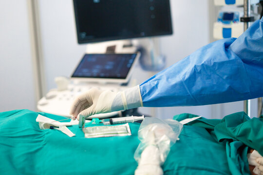 Doctor performing medical procedure using ultrasound guidance
