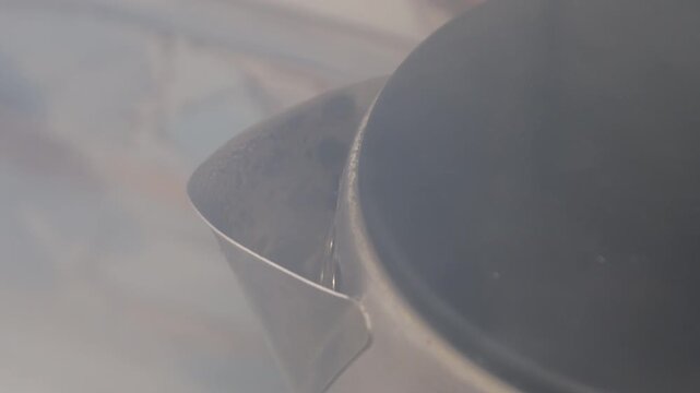 A close-up shot of a coffee pot on a kitchen counter