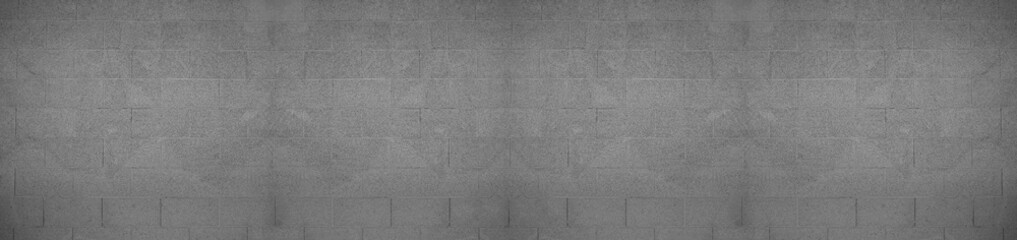 Front view of a wall made of gray slabs. background of a new and modern wall or building exterior grey slabs Marble brick pattern floor abstract natural marble black gray wall Top view and front view © Maxim Chuev
