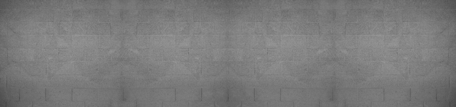 Front view of a wall made of gray slabs. background of a new and modern wall or building exterior grey slabs Marble brick pattern floor abstract natural marble black gray wall Top view and front view