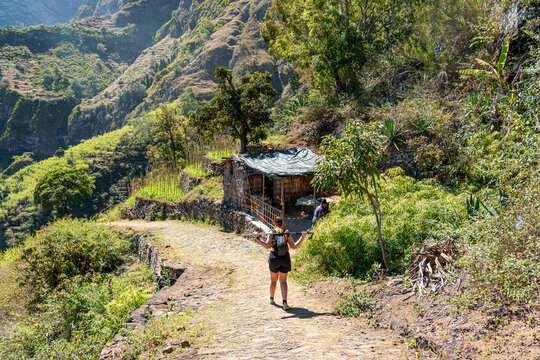 Woman on a pedestrian path in Vale de Paula, Santo Ant&atilde;o Island, Cape Verde.