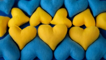 Obraz premium horizontal fluffy yellow and blue hearts fabric texture background for phone wallpapers