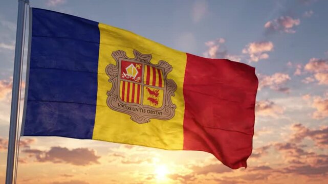 The national flag of andorra waving against a beautiful sunset sky
